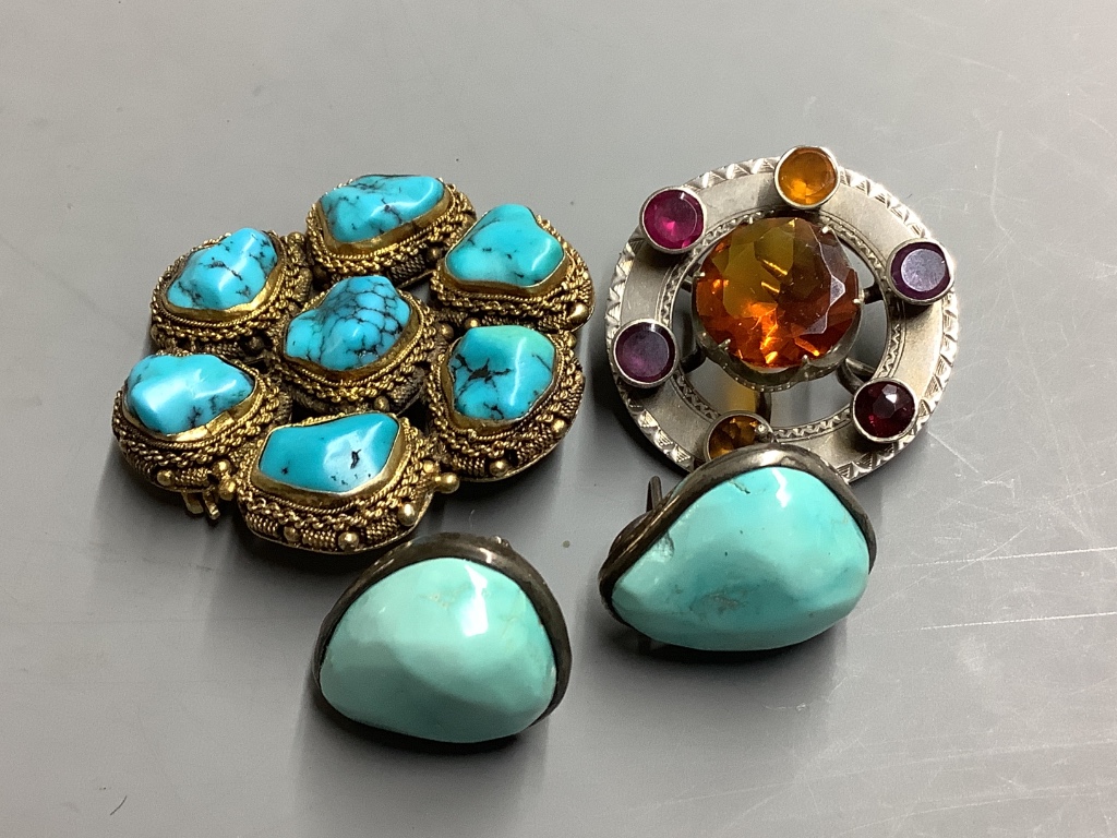 A circular silver gilt and seven-stone turquoise brooch, a pair of silver-mounted clip earrings and a Scottish silver and cairngorm kilt pin